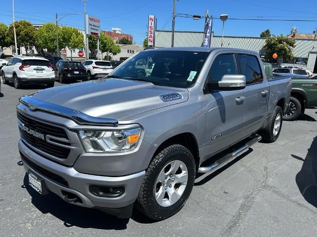 2021 RAM 1500 Big Horn 4x4 Crew Cab 5'7" Box in Billet Silver Metallic Clearcoat — front three-quarter view