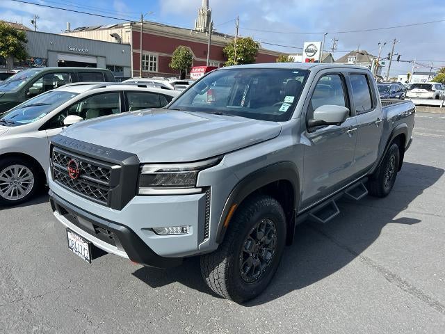 2024 Nissan Frontier Crew Cab 4x4 PRO-4X in Boulder Gray Pearl — front three-quarter view