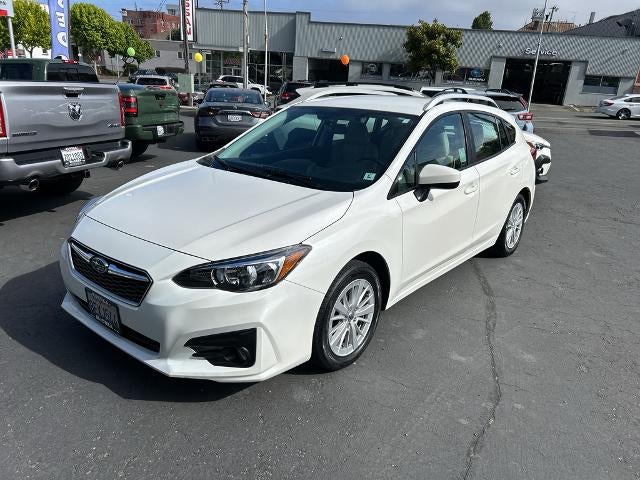 2018 Subaru Impreza 2.0i Premium 5-door CVT in Crystal White Pearl — front three-quarter view